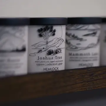 Sell on Amazon ad: Mikey Kim was laid off in 2020 and started making candles in his living room. His first batch of 500 sold out in a month through Amazon's store. Today, Hemlock Park has sold over 1 million candles — all handmade in the U.S. 🕯️